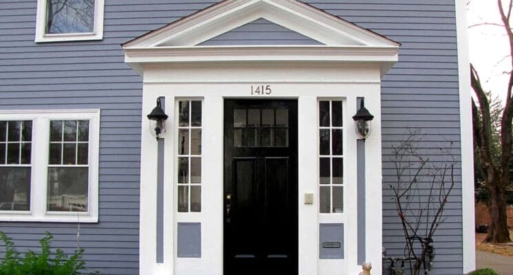 front door and bue painted house