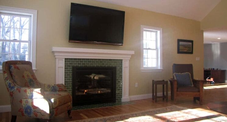 living room, tv, and fireplace