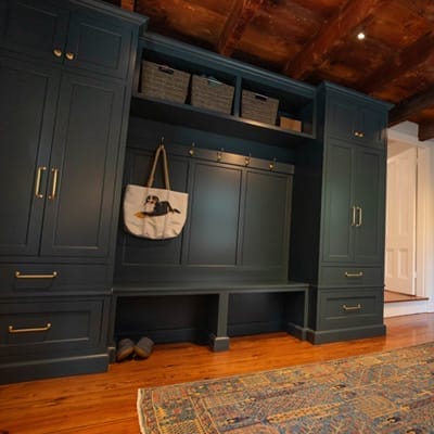Image depicting an interior painting project showcasing a mudroom with green cabinets, located in Lexington Massachusetts.